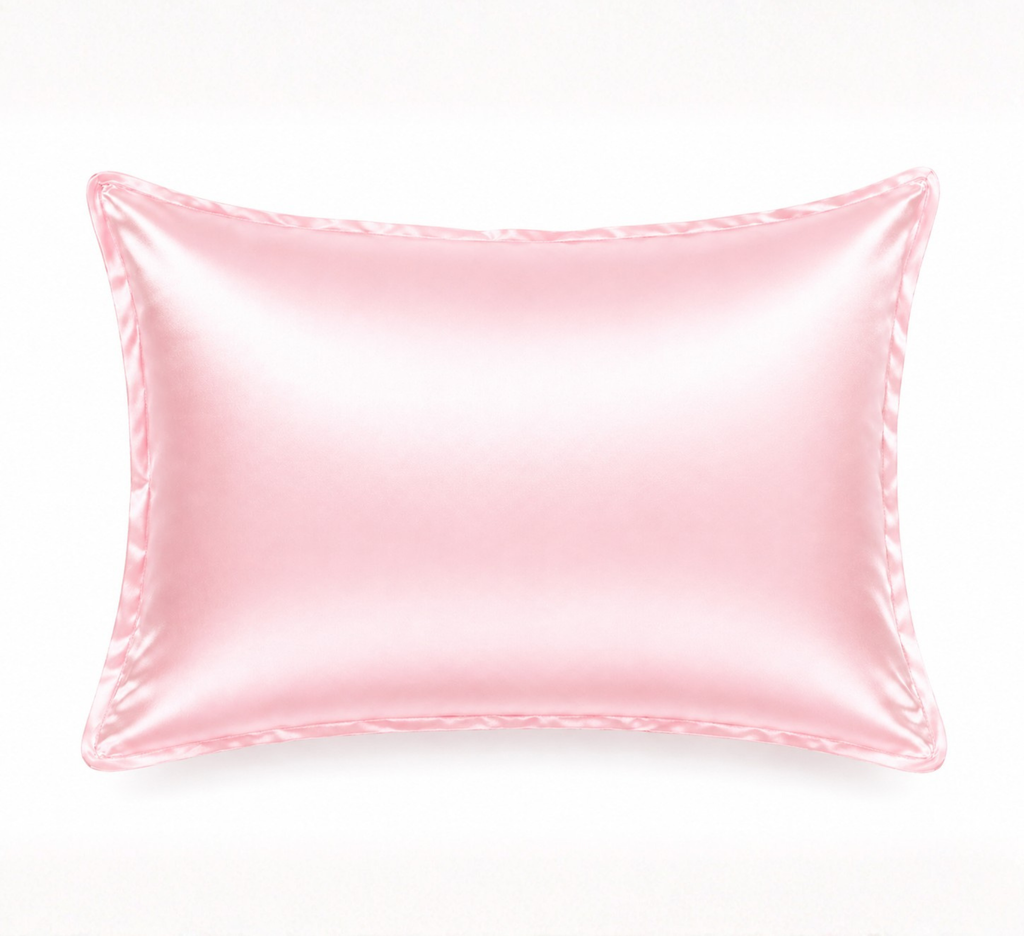 Pink mulberry silk pillowcase styled for beauty sleep ritual