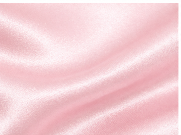Pink mulberry silk pillowcase styled for beauty sleep ritual