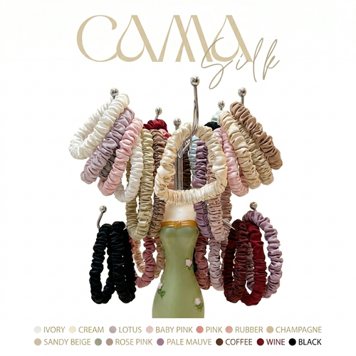 Collection of mulberry silk scrunchies from CAMA Reform in multiple colorways
